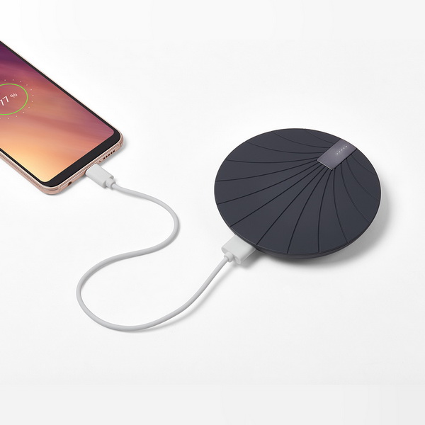 image A 2-in-1 power bank with built-in wireless charge